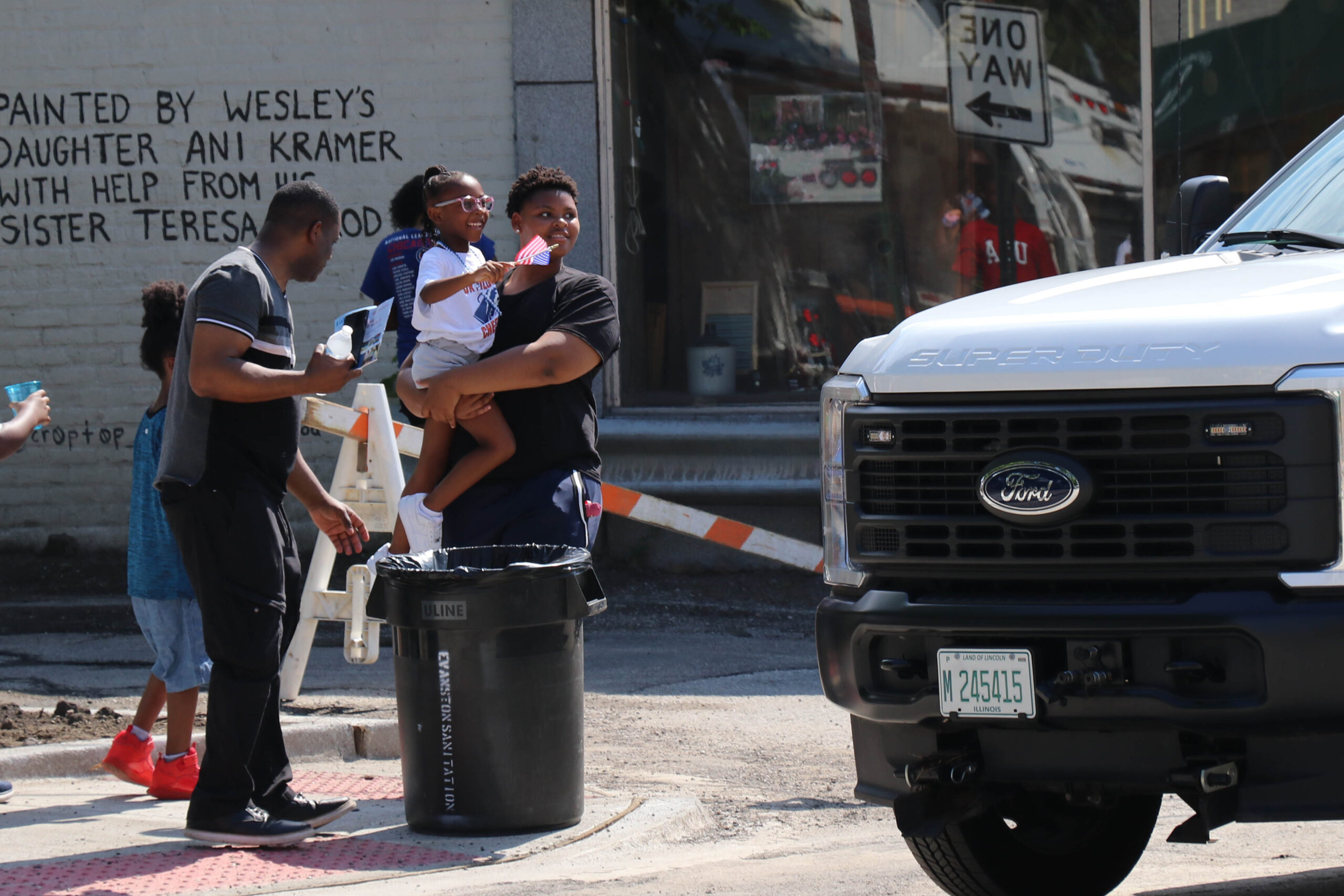 As the floats clear out, the cleanup crew rolls in 
